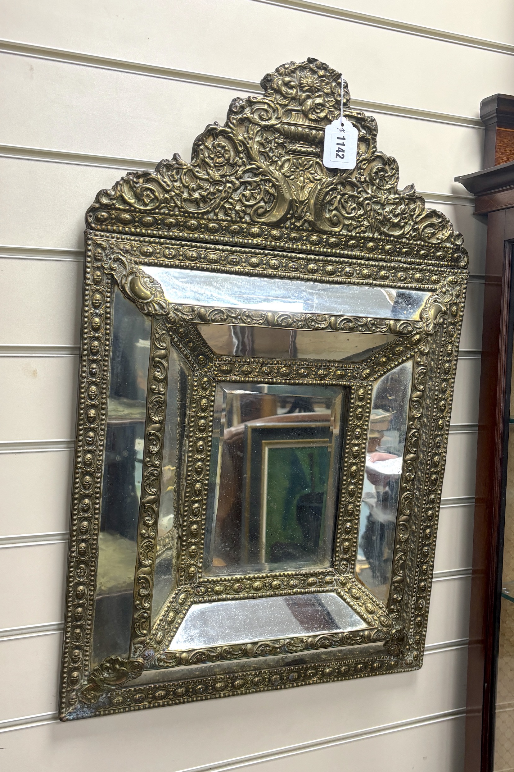 A French embossed brass rectangular marginal plate wall mirror, width 46cm, height 73cm